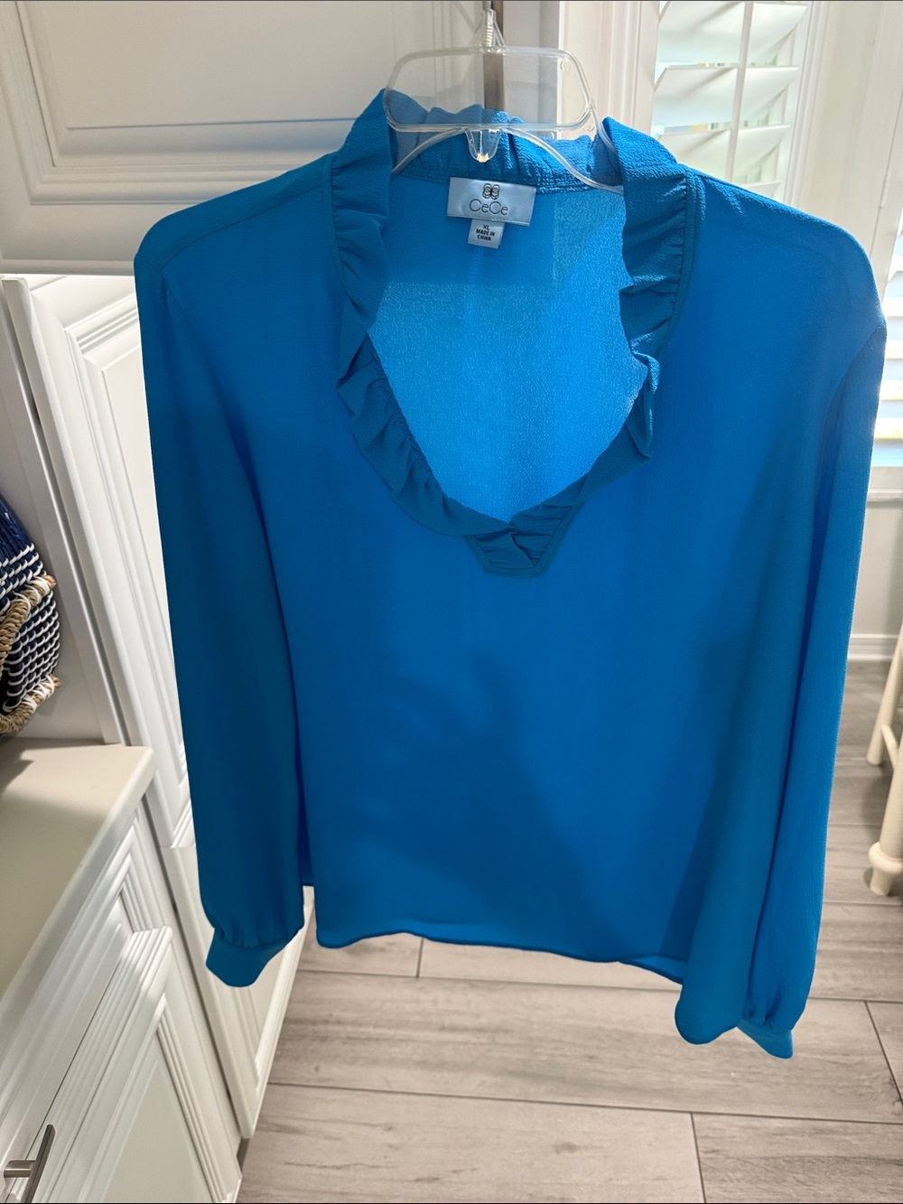 CeCe Ruffle V-Neck Long Sleeve Blouse in Bright Blue